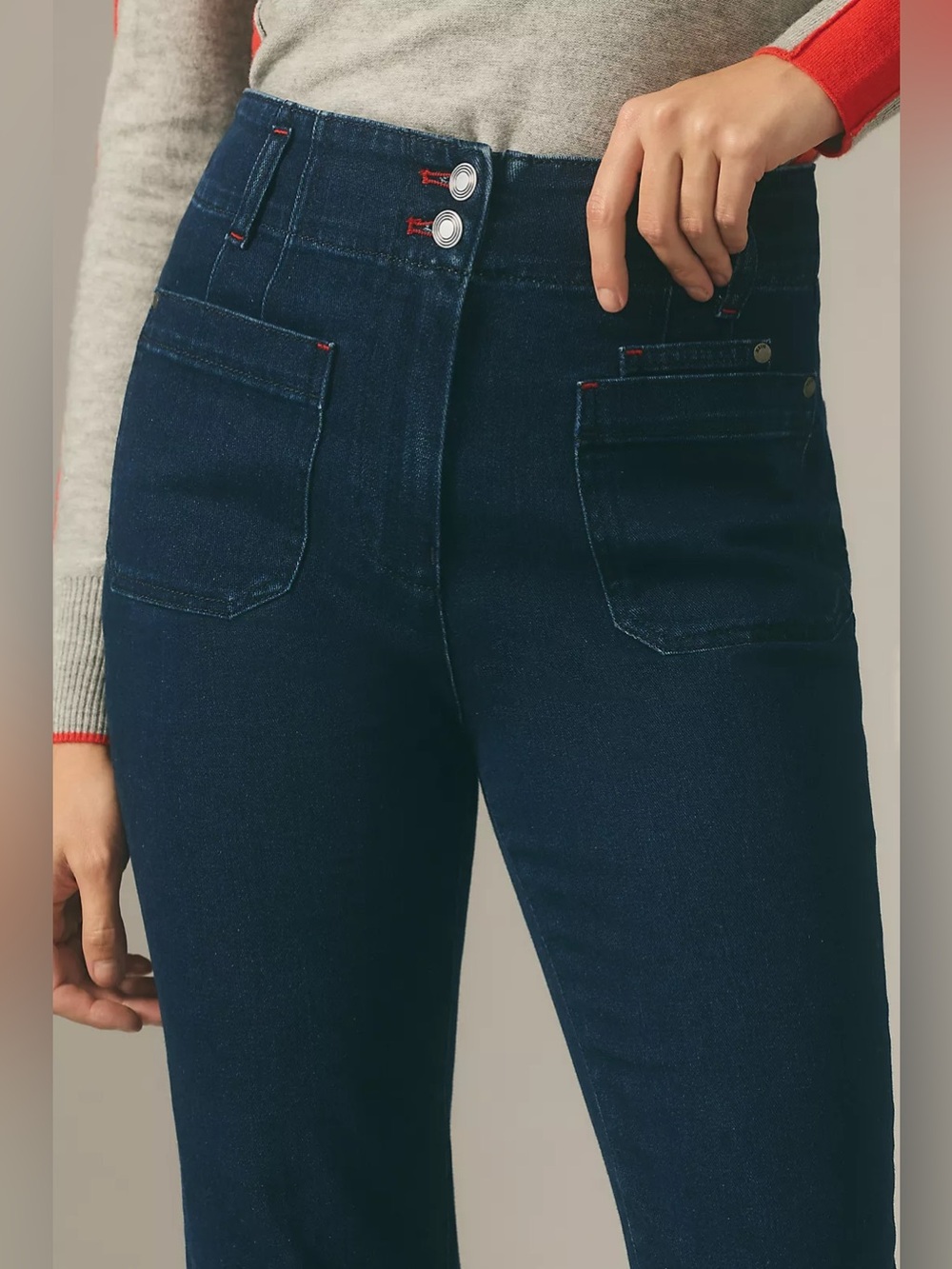 Anthropologie Maeve Junie High-Rise Slim-Leg Jeans in a dark blue wash.